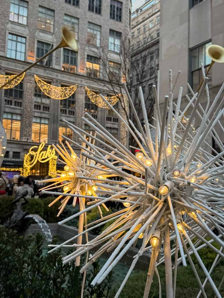 Rockefeller decorations with Saks in background New York