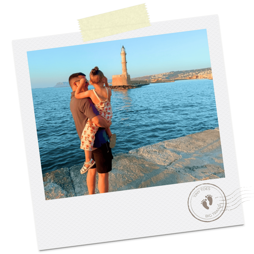 Chania lighthouse on polaroid, featuring a little girl and her dad