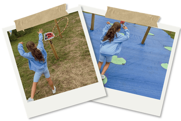Martin Mere activities - girl playing throwing hoops and frog jumping pads
