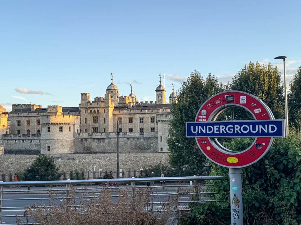 London underground logo with Tower of London in the background